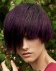 Short hair with long bangs and violet highlights