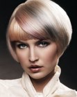 Short bob haircut with layered hair colors and double bangs