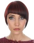 Short and slightly tilted haircut with elements of the Purdey look