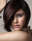 Brunette forward-angled bob with softening razor-tapered ends