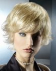 Short blonde hairstyle with layers and lifted ends