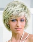 Short silvery hair with layers and a round silhouette