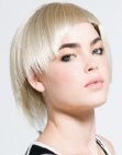 Short hairstyle with bowl cutting, undercutting and jagged lines