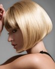 Blonde jaw length bob with forward swept ends