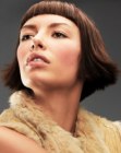 Jaw level bob cut with short bangs for brown hair