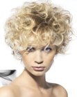 Short blonde hair with curls and airy volume