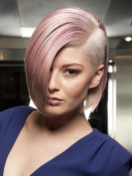 Blonde and pink hair with a shaved section