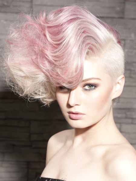Wavy pink hairstyle with an undercut section