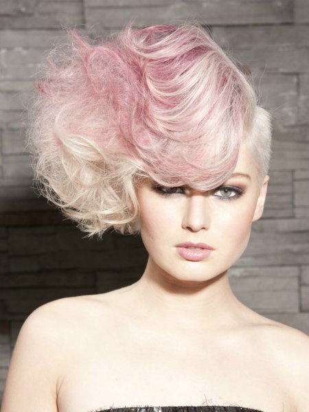 Pink pastel color hair with waves and an undercut