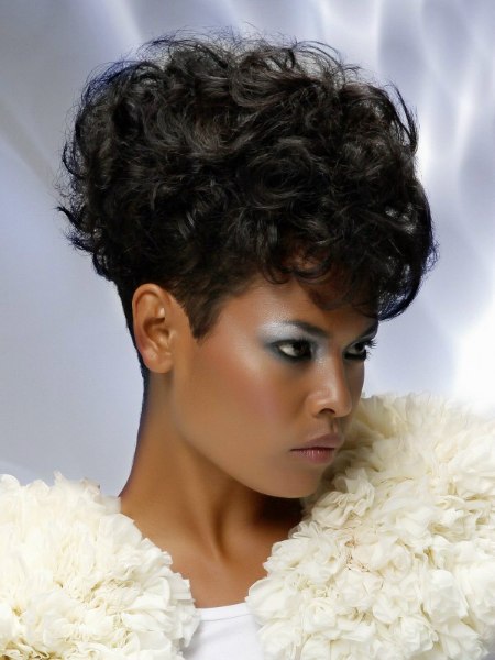 Curly and short black hair with clipper-cut sides