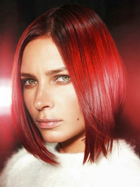 Medium long bob with a ruby red hair color
