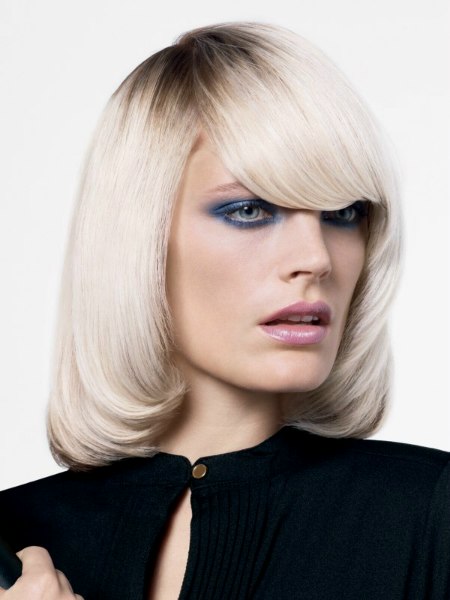 Long blonde bob with 1980s styling