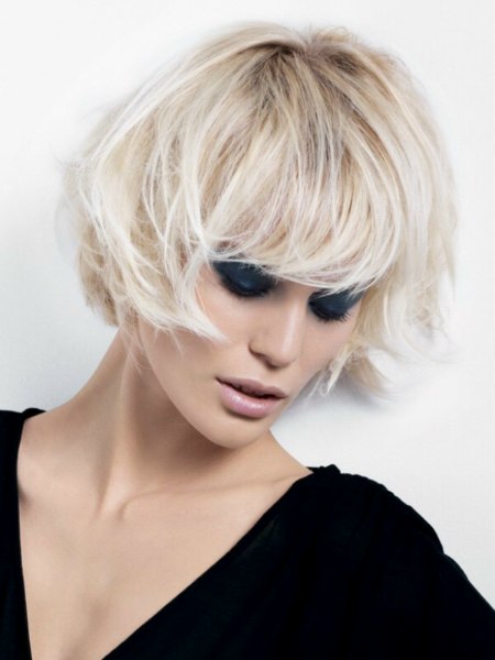Short blonde bob styled for a bed head look