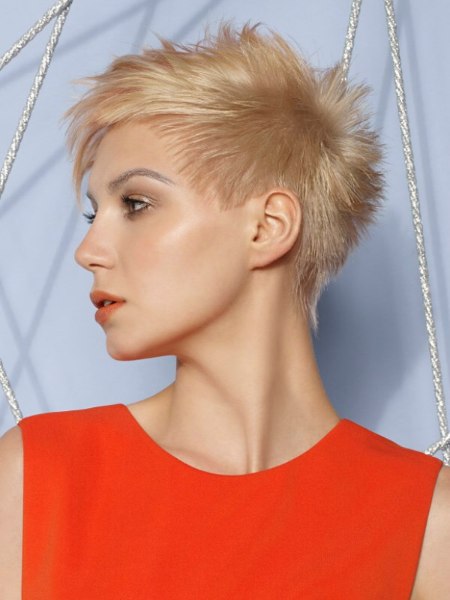 Side view of a very short blonde haircut