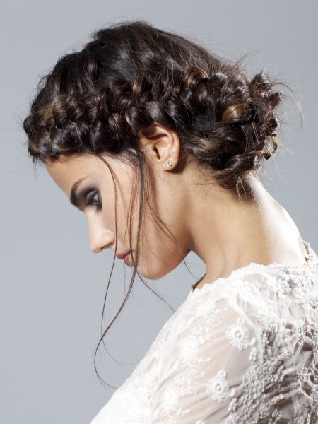 Peasant style updo with a French braid