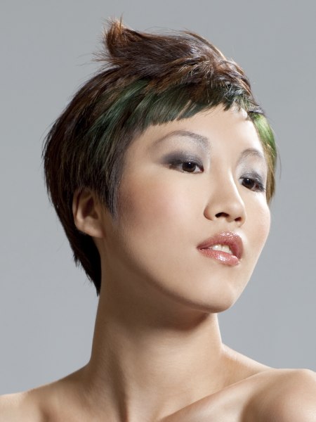 Short hairstyle with green hair coloring