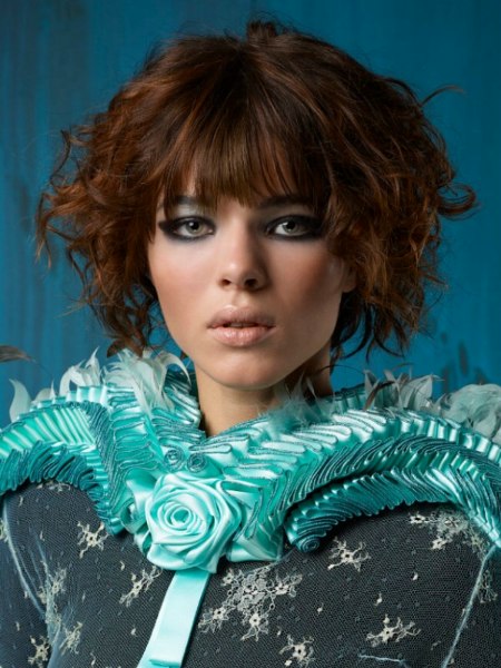 Short hairstyle with curls and highlights