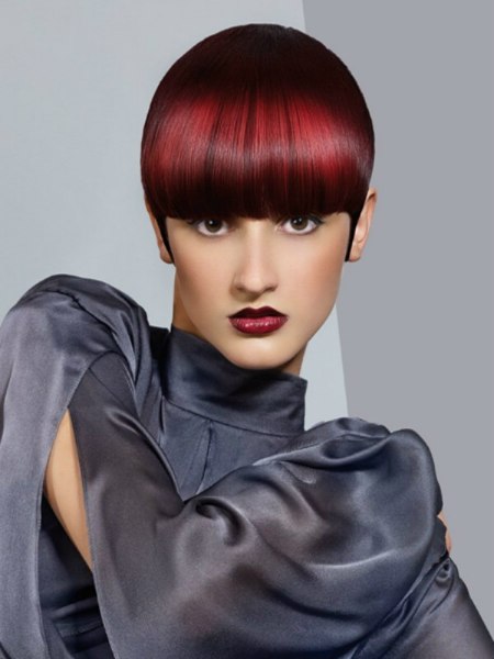 Short helmet style cut for intense red hair