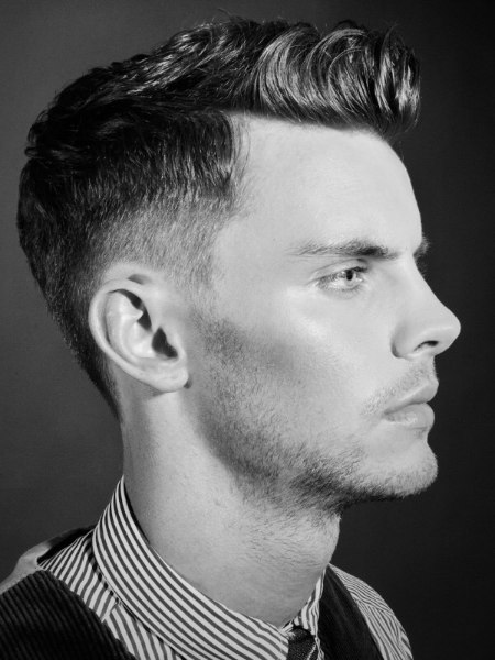 Neat men's hairstyle with short shaven sides