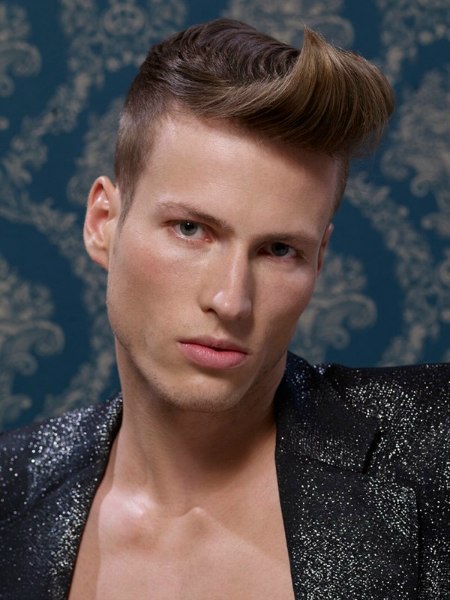 Neat male haircut with clipper-cut sides