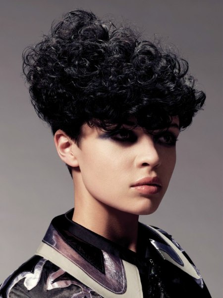 Short pitch black hair with large curls