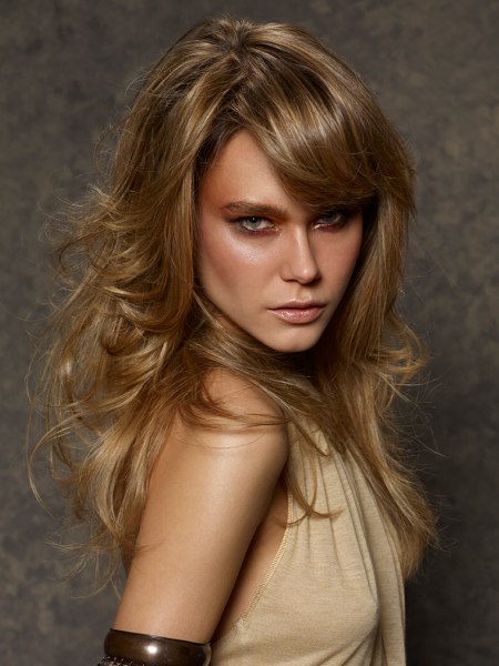 Seductive long hairstyle with a side fringe