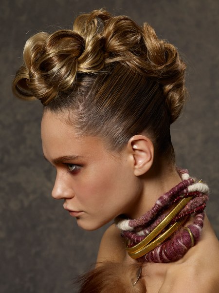 Braided up-style for hair with different shades of blonde