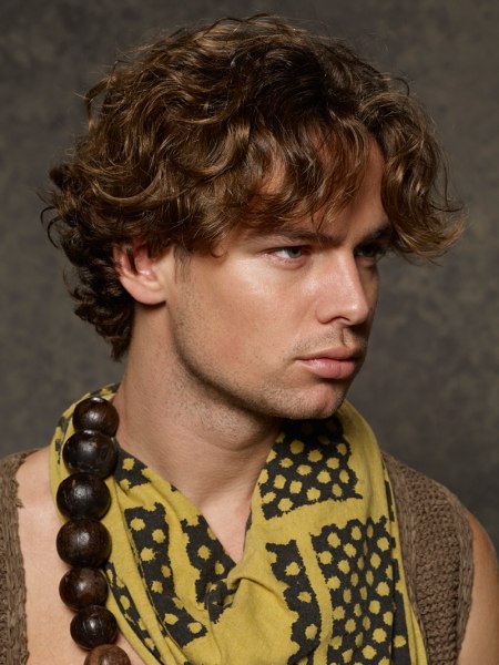 Male surfer hairstyle with curls