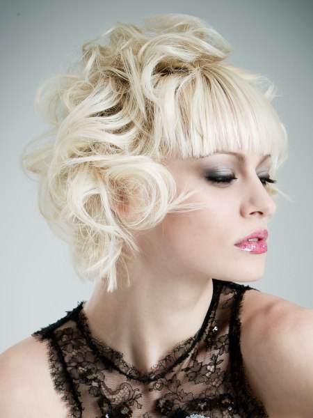 Short blonde hair with high volume curls