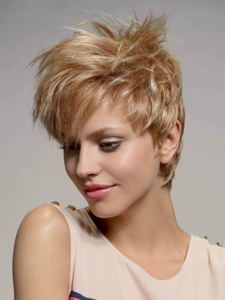 Short blonde pixie cut with layers