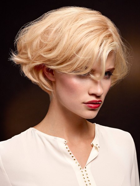 Short blonde bob with a side fringe