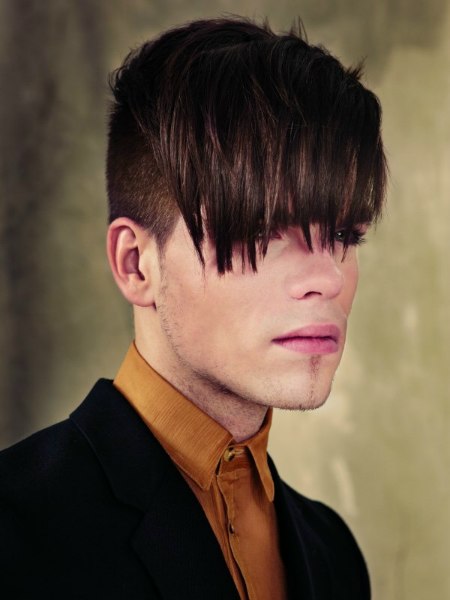 Clipper-cut hair with long bangs for men