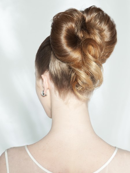 Back view of an updo with curled hair