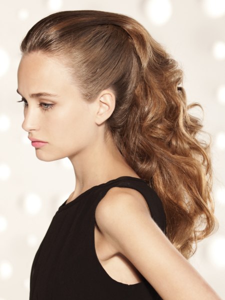 Festive look with a curly ponytail for long hair