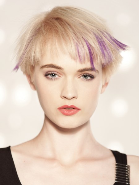 Short blonde hair with jagged edges and purple streaks