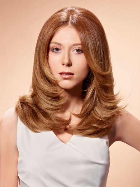 Supple, healthy long hair with a tapered cutting line
