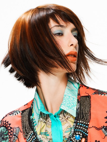 Bob cut with steep angles and feathery texture