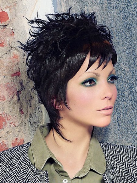 Black pixie cut with strands that hug the neck