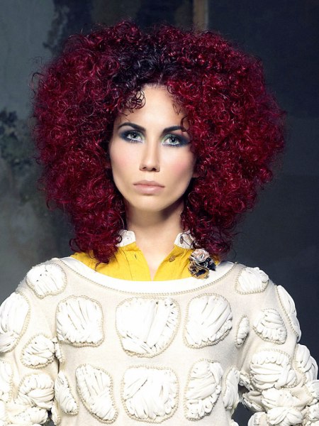 Shoulder-length Afro hairstyle with small curls