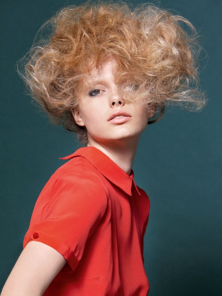 Chin length hair curled and supported by hairpins