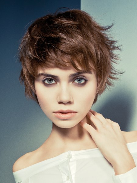 Brunette pixie cut with layers and volume