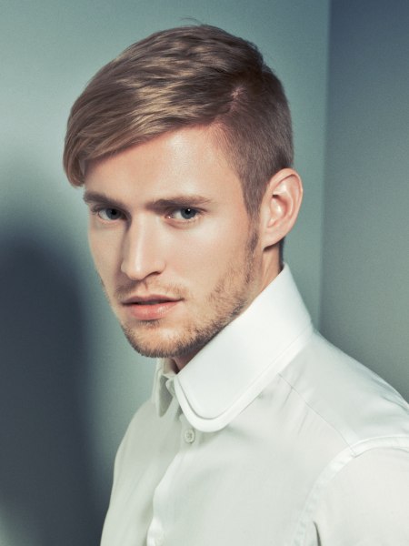 Haircut with short clipped sides for men