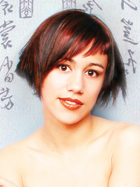 Short bob haircut with texture and a diagonal fringe