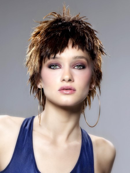 Short hairstyle with longer strands and textured tips