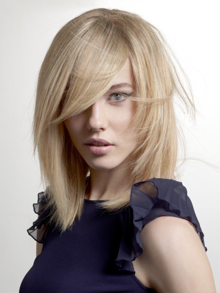 Long straight hair with a tapered cutting line along the face and neck