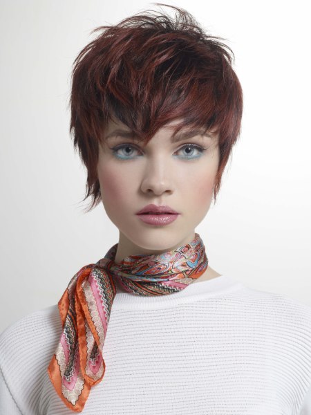 Pixie cut with narrow sides and top volume