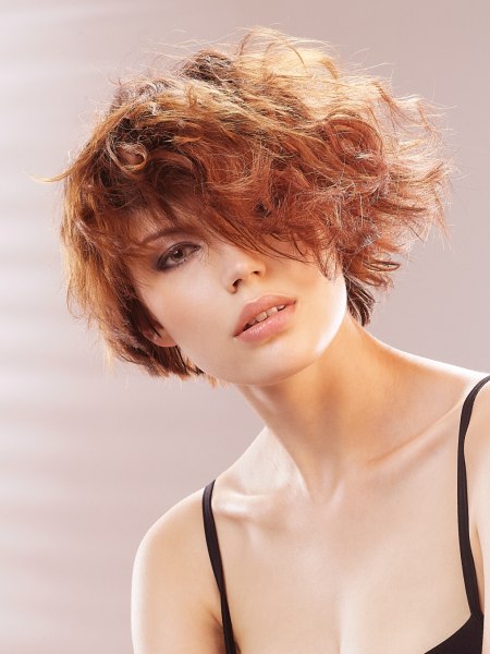 Short asymmetrical hairstyle with layers and curls