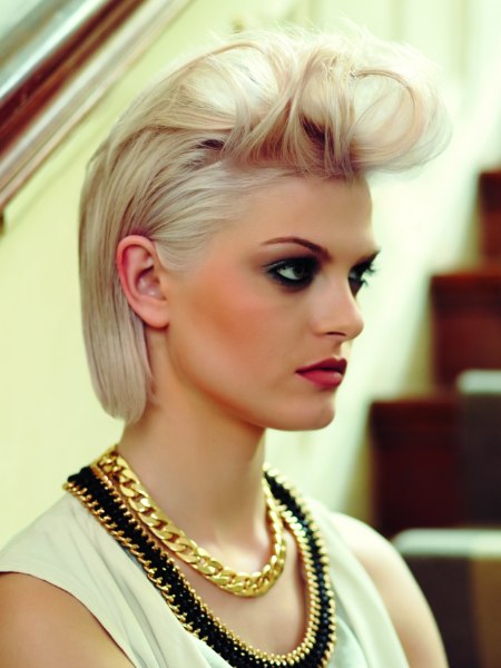 Short hairstyle with a rolled up fringe