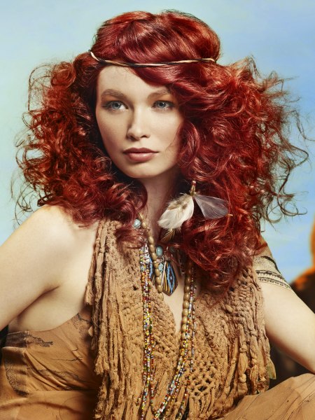 Ethnic look with curls and a hair band for red hair