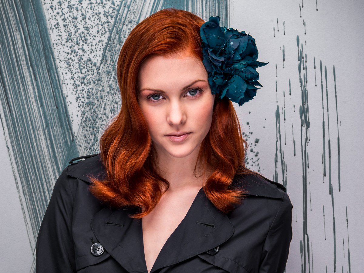 Fashion hairstyles for hair with different shades of red